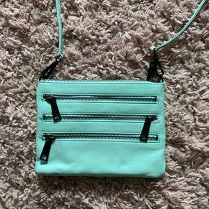 ‘3-Zip Rocker’ Crossbody Bag